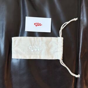 OSSA BNWT Dust Bag in Cream